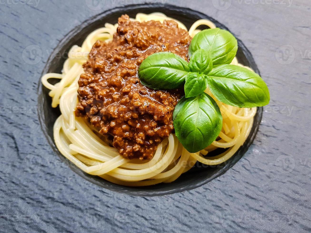 Spaghetti Bolognese with tomato sauce photo