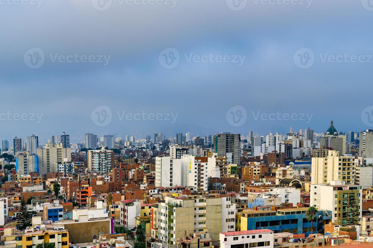 Skyscrapers and many houses in the city of Lima in Peru photo