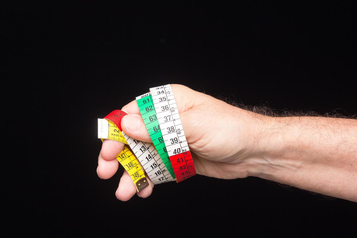 Yellow flexible tape measure photo