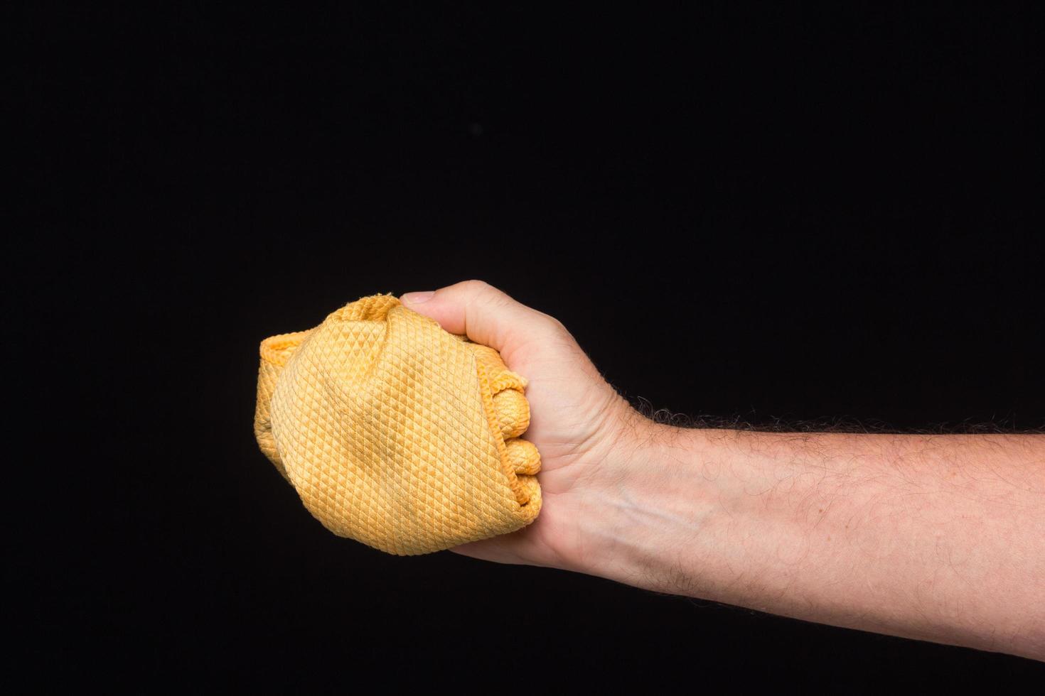 Cleaning cloth in one hand photo