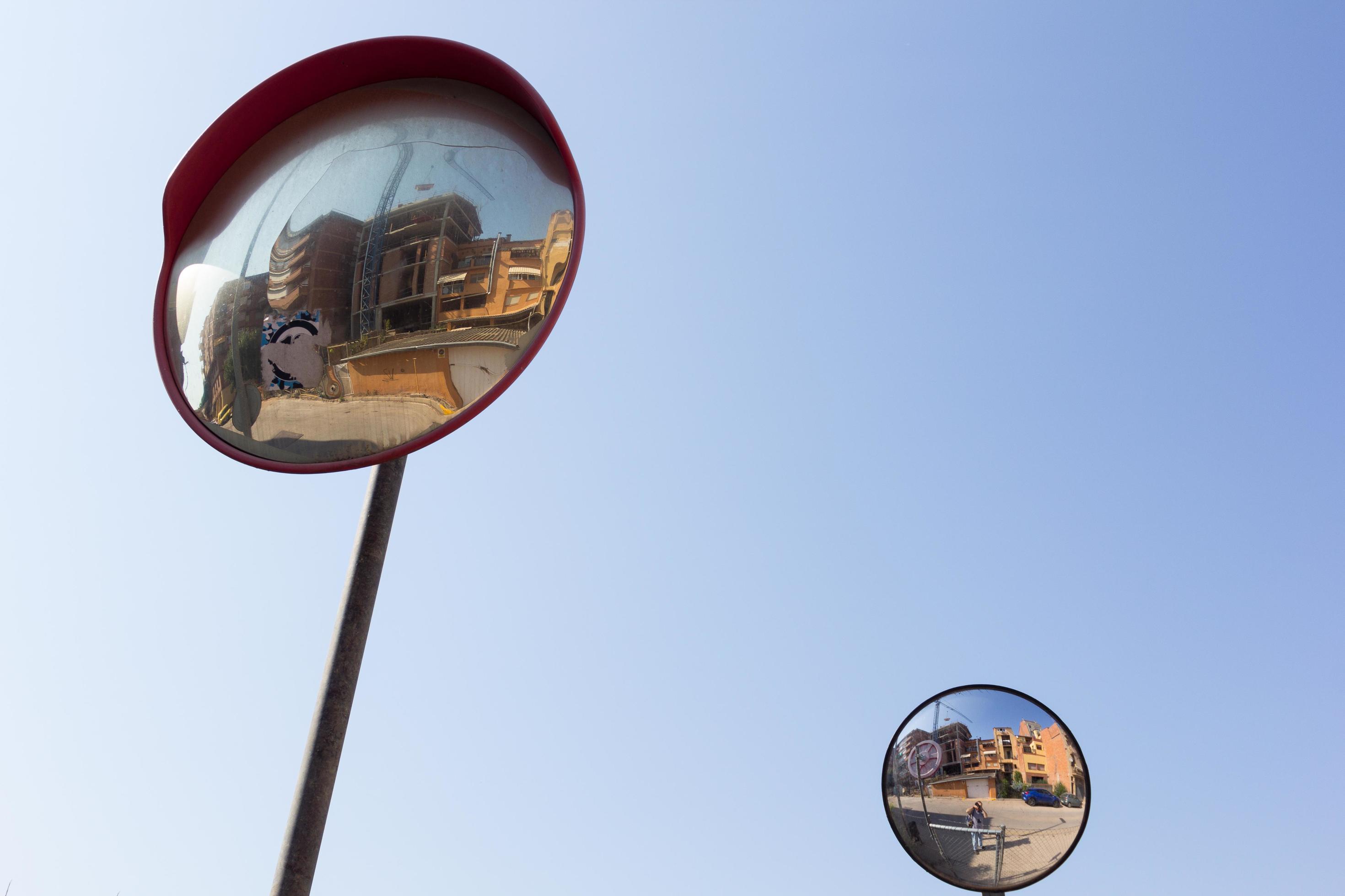 Mirrors for drivers to see around corners 3039368 Stock Photo at Vecteezy