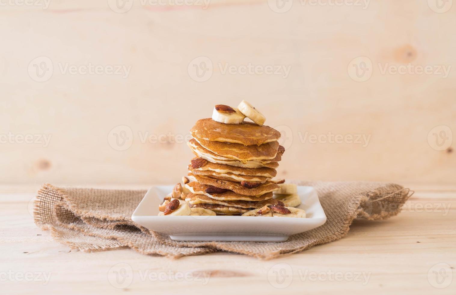 Almond banana pancake with chocolate syrup photo