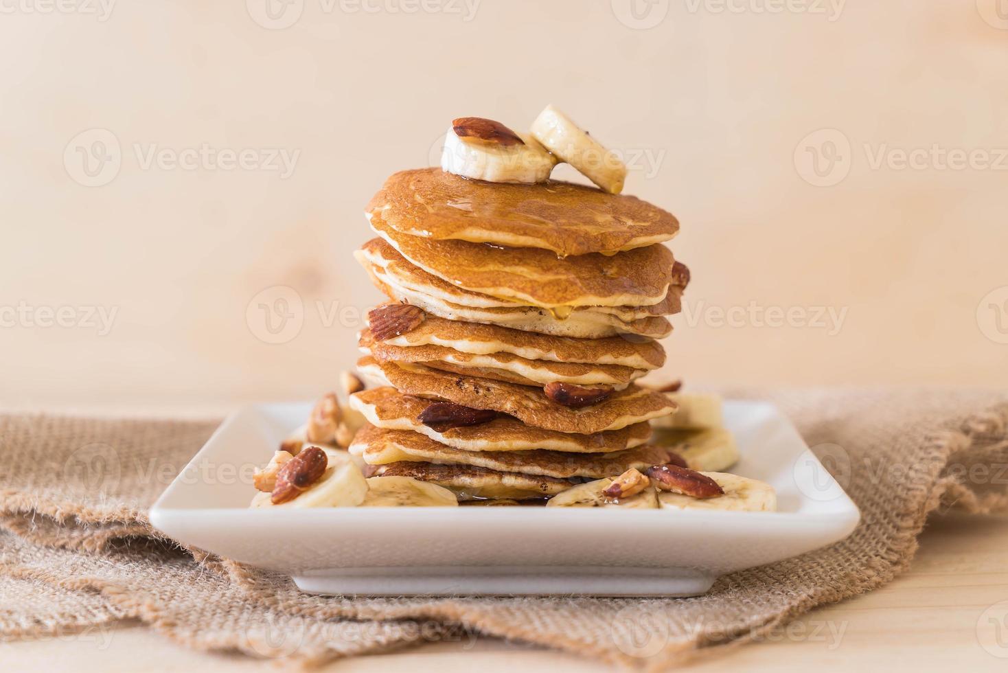 Almond banana pancake with chocolate syrup photo