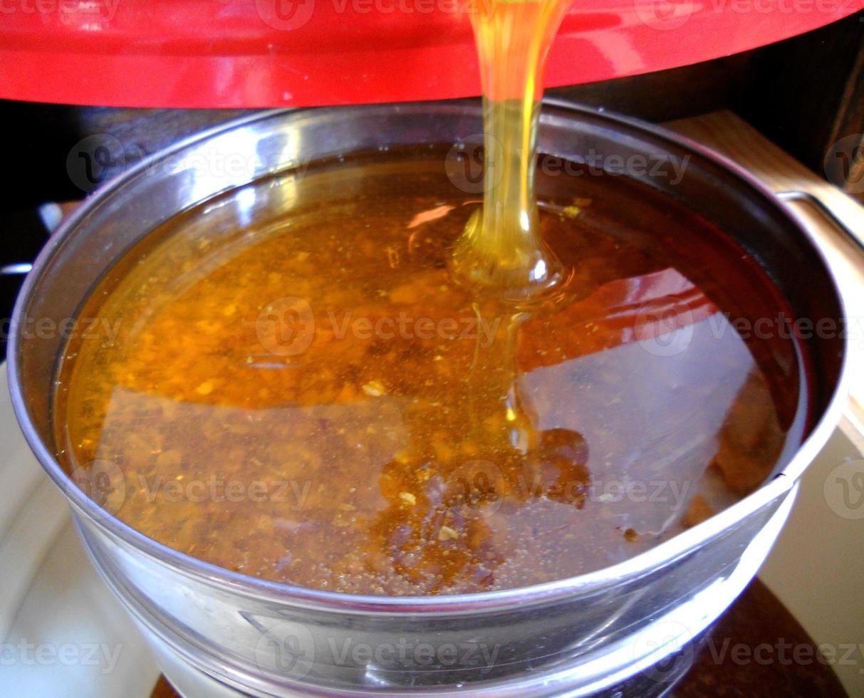 Background texture, dropping drops of sweet honey photo