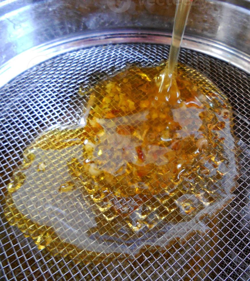 Background texture, dropping drops of sweet honey photo