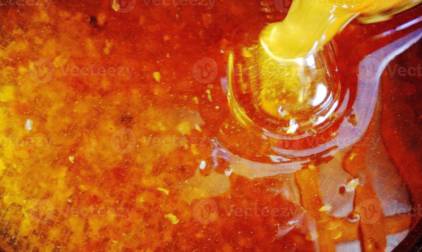 Background texture, dropping drops of sweet honey photo