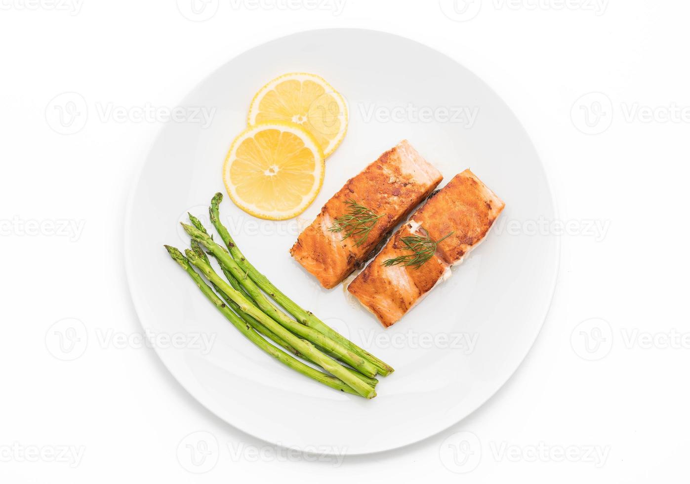 Grilled salmon steak on the table photo