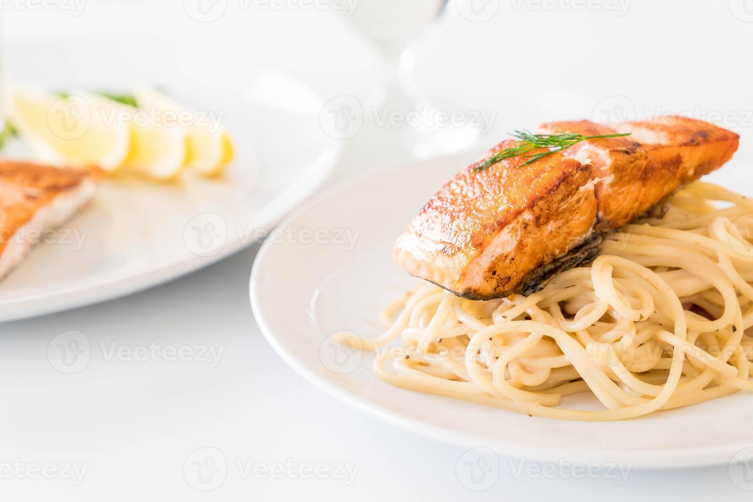 Spaghetti cream sauce with grilled salmon photo