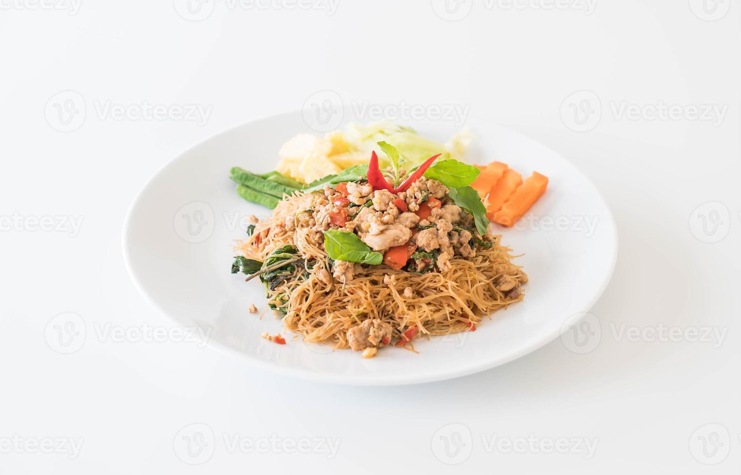 Stir-fried noodle with pork and basil photo