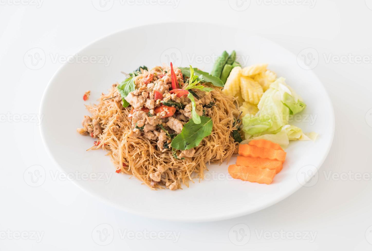 Stir-fried noodle with pork and basil photo
