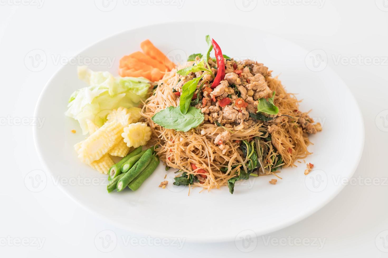 Stir-fried noodle with pork and basil photo