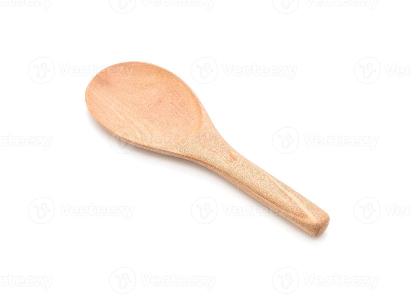 Wooden ladle on white background photo