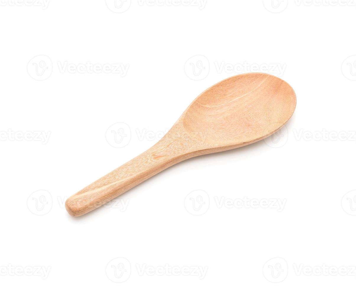 Wooden ladle on white background photo