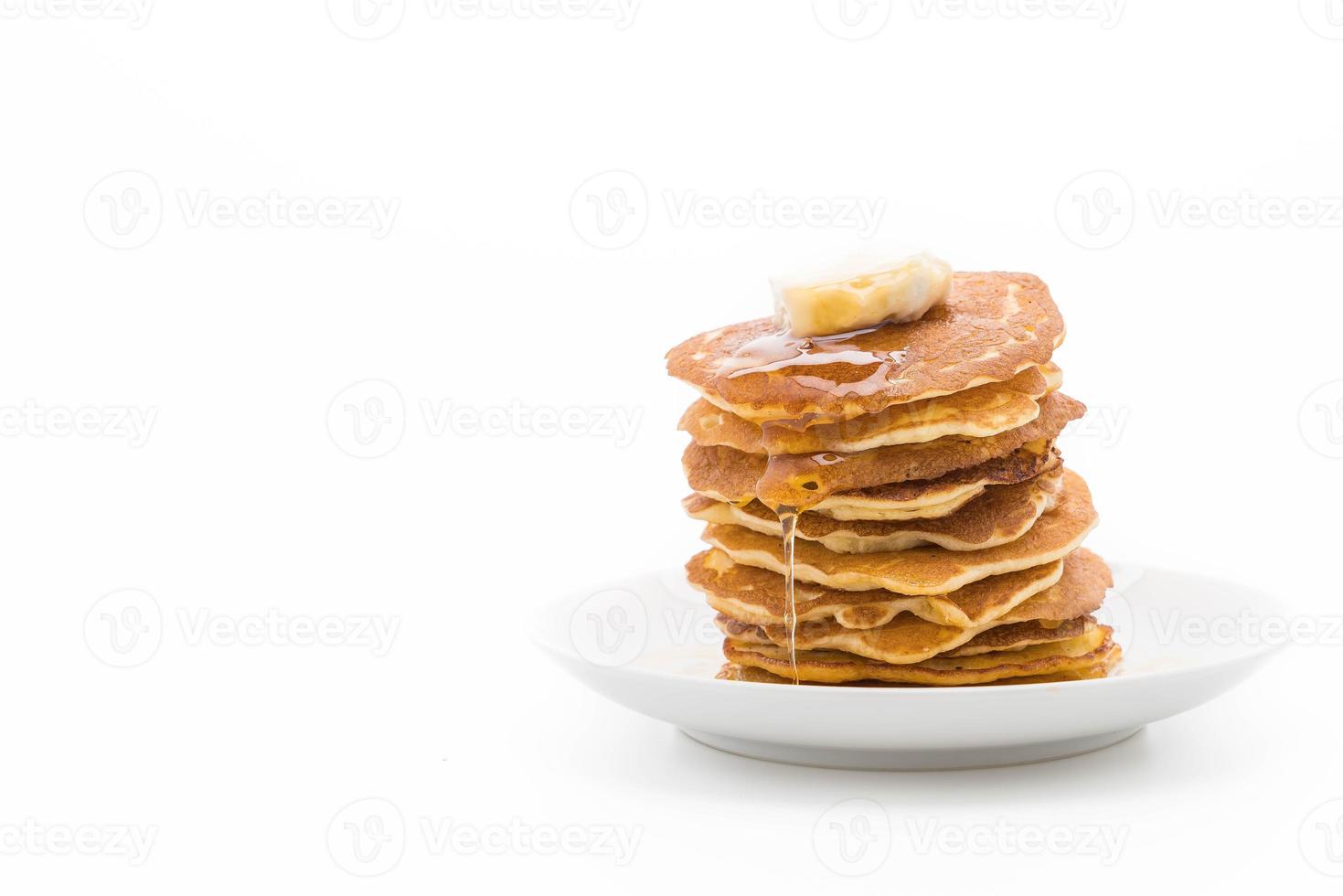 Cheese on pancake stack with honey photo