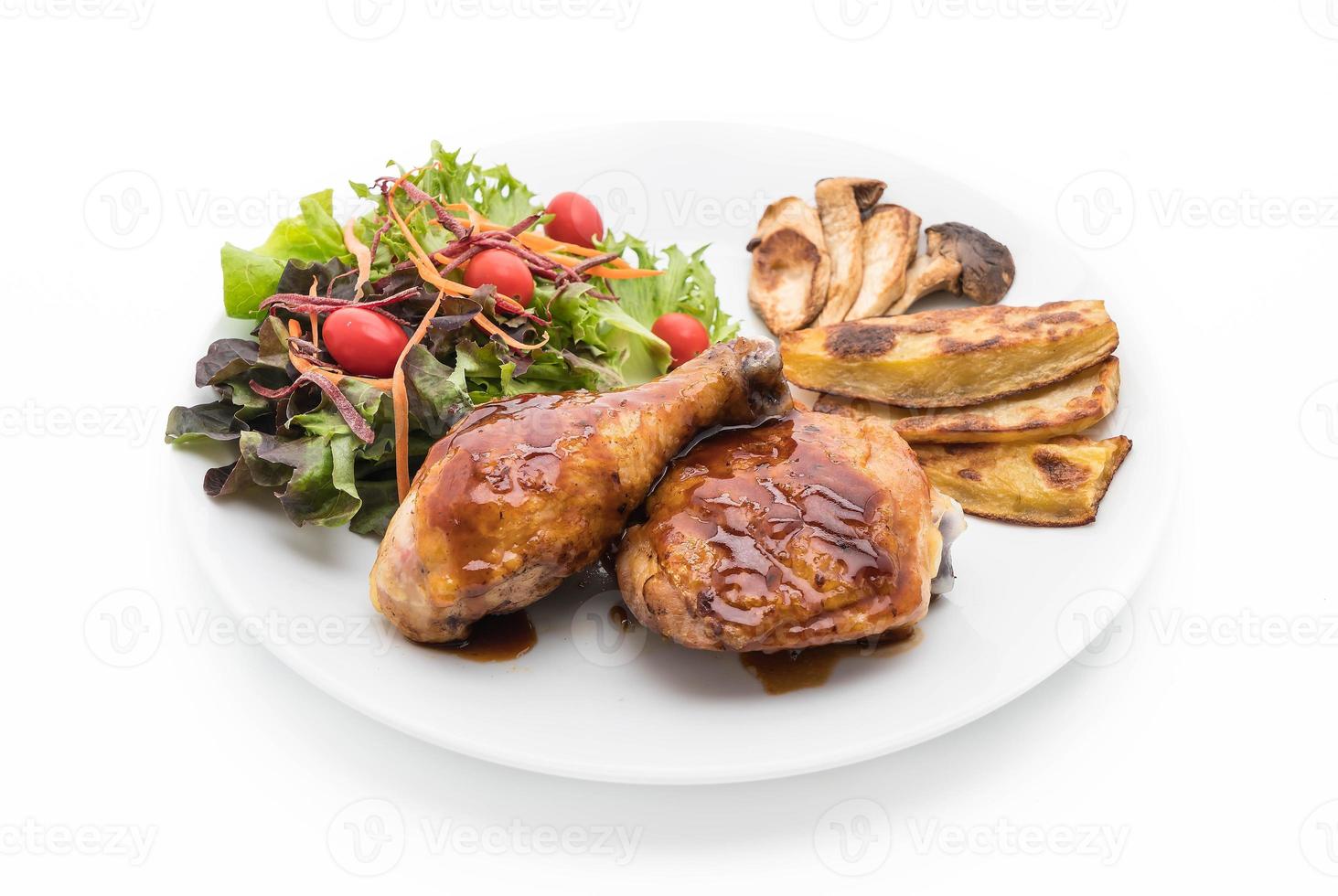 Grilled chicken steak with teriyaki sauce on dining table photo