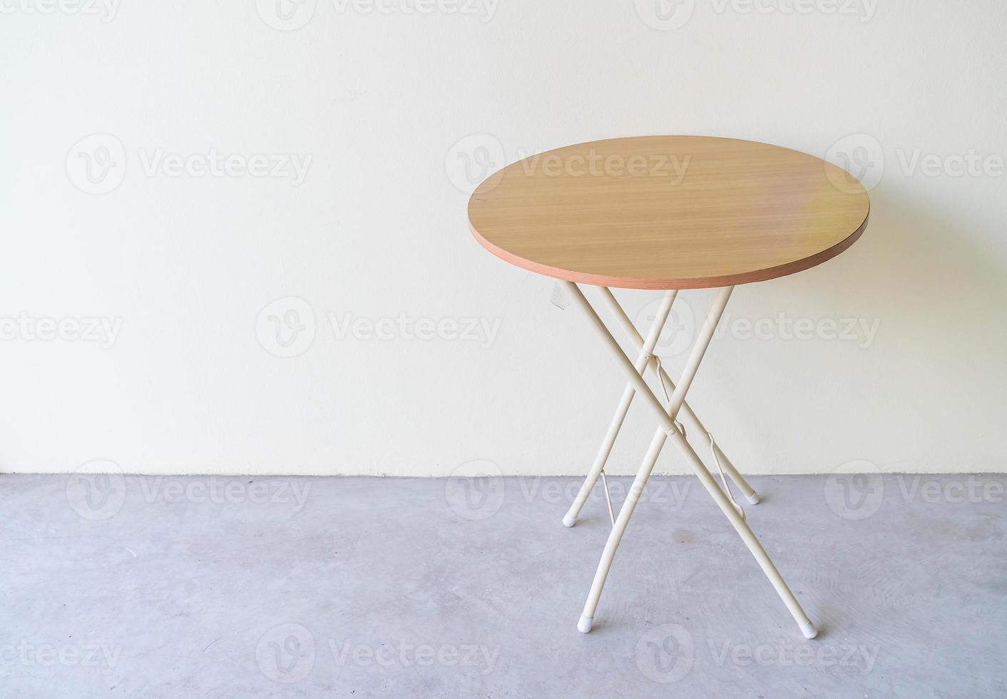 Empty table with wall background photo