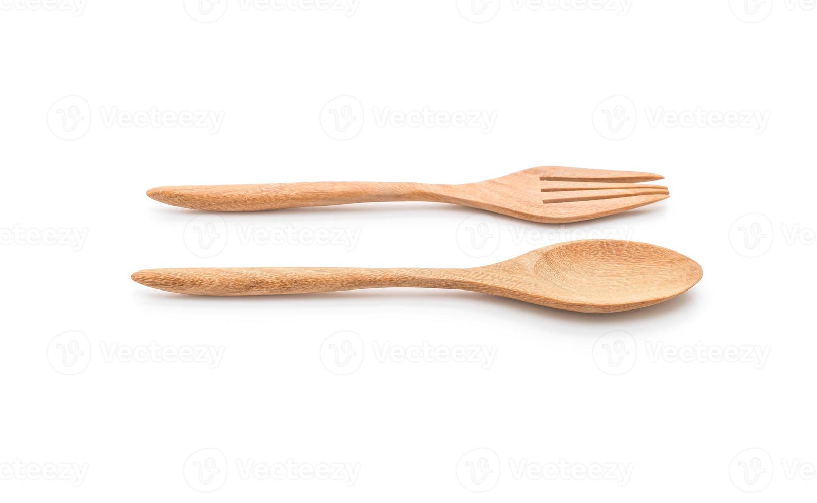 Wood spoon and fork on white background photo