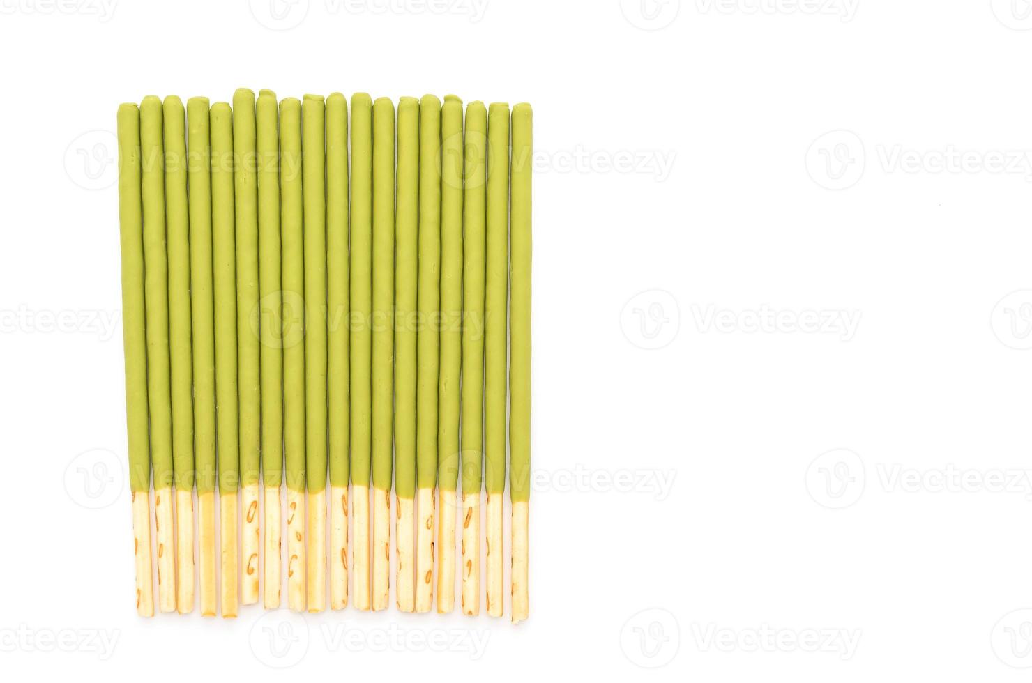 Biscuit stick with green tea flavored on white background photo