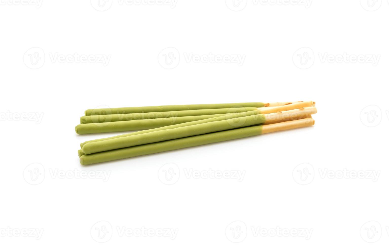 Biscuit stick with green tea flavored on white background photo