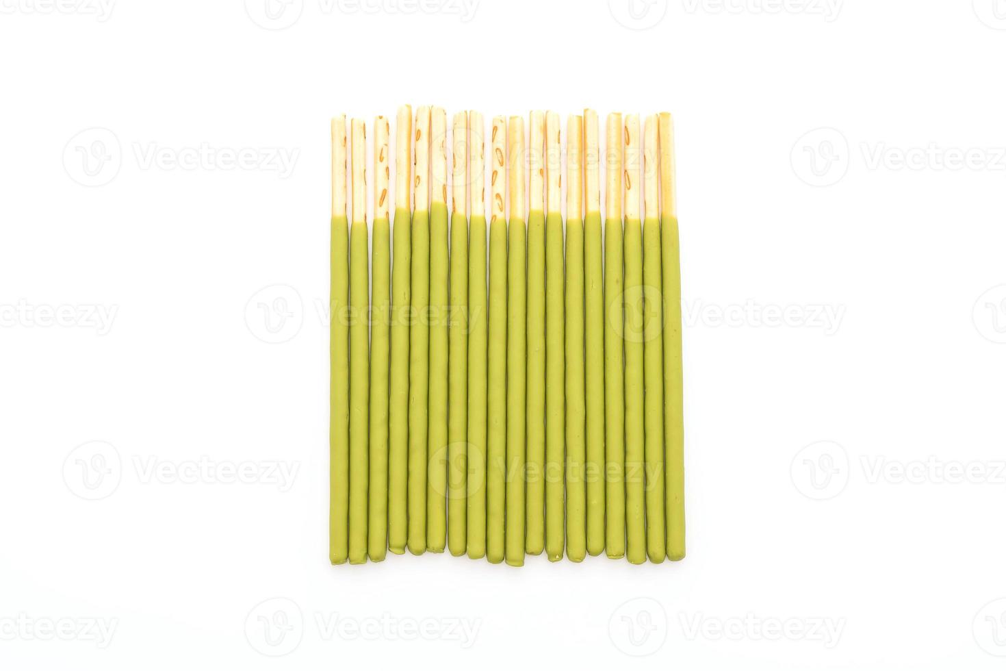Biscuit stick with green tea flavored on white background photo