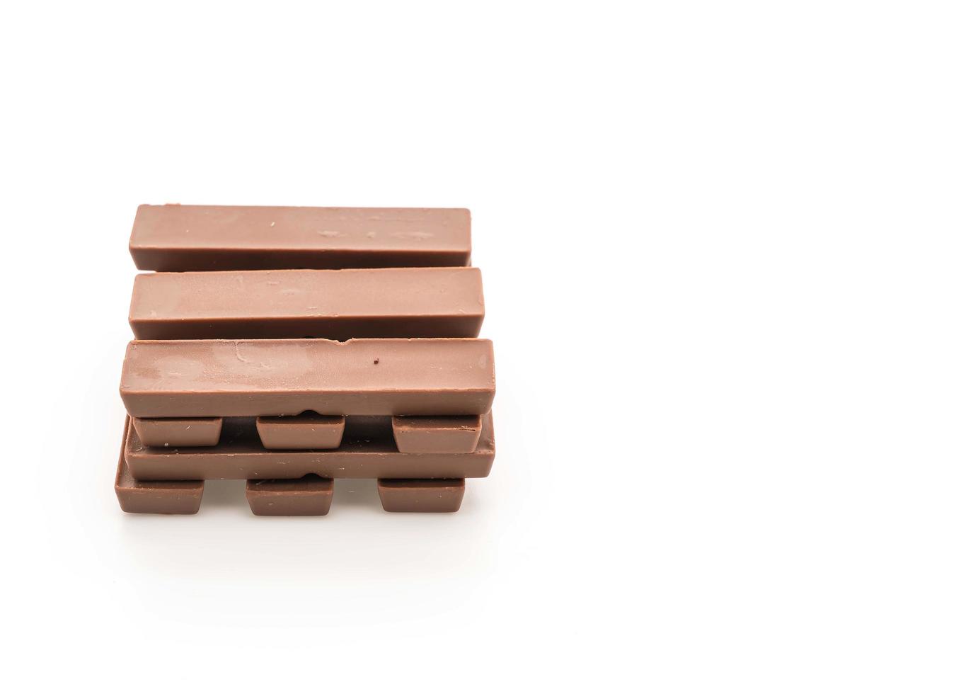 Chocolate bars on white background photo