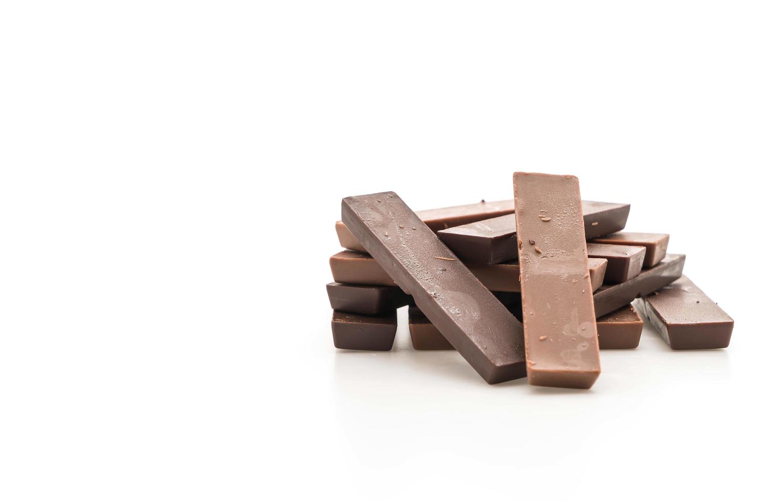 Chocolate bars on white background photo