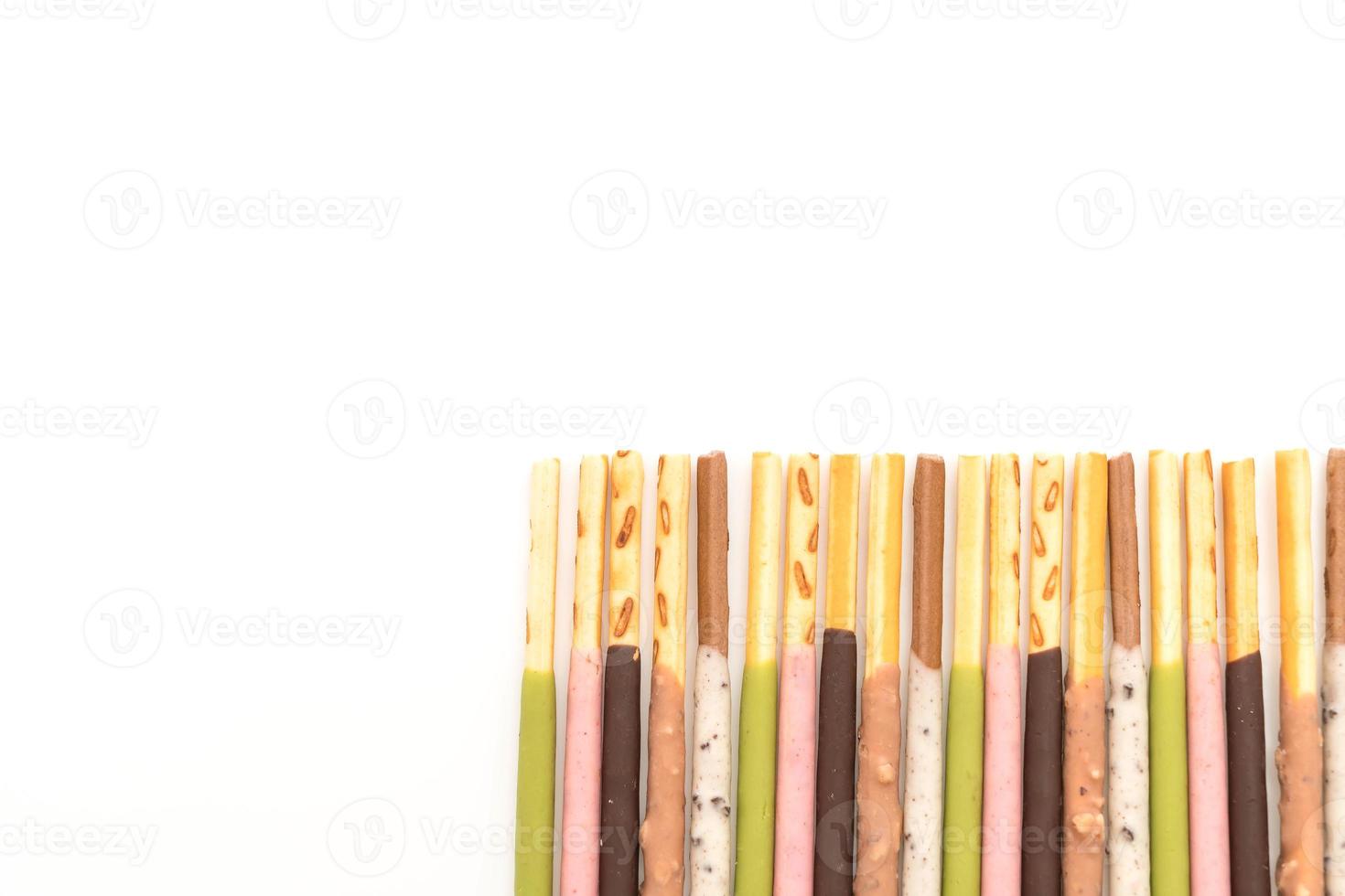 Biscuit stick with mixed flavored on white background photo