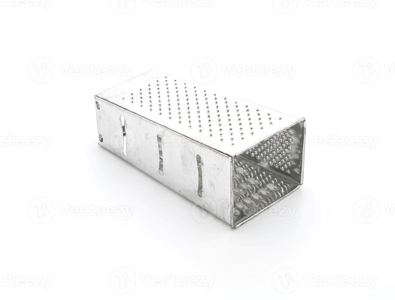 Manual grater on white background photo