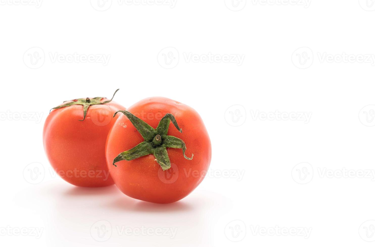 Fresh tomatoes on white background photo