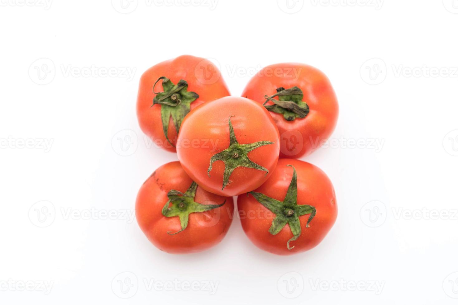 Fresh tomatoes on white background photo