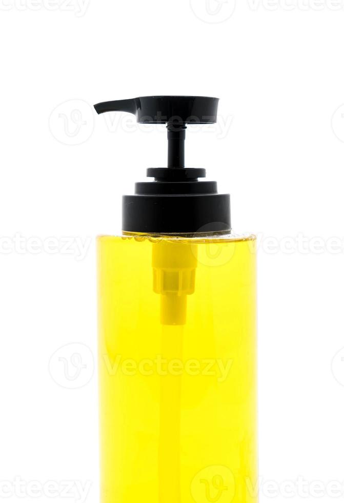 Dish washing soap in bottle on white background photo