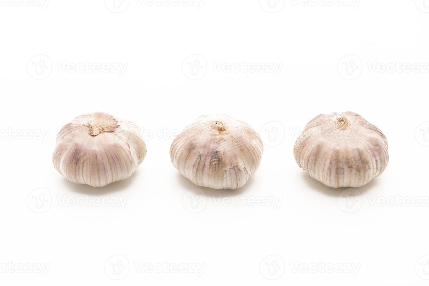 Fresh garlic on white background photo