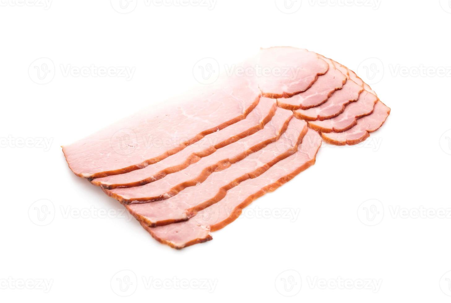 Sliced ham on white background photo