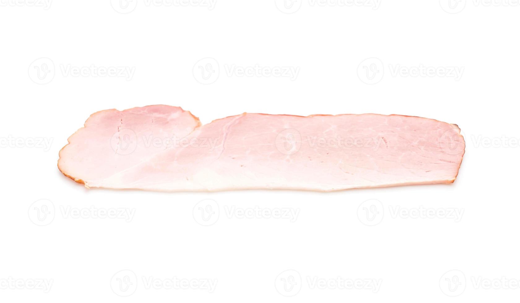 Sliced ham on white background photo