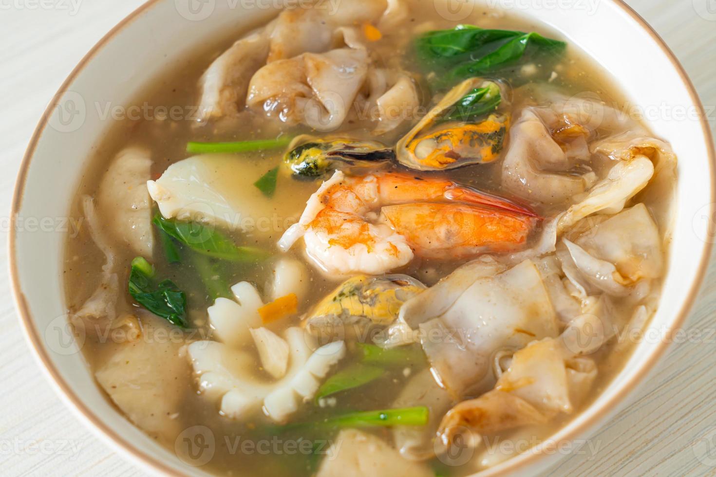 Wide Rice Noodles with Seafood in Gravy Sauce photo