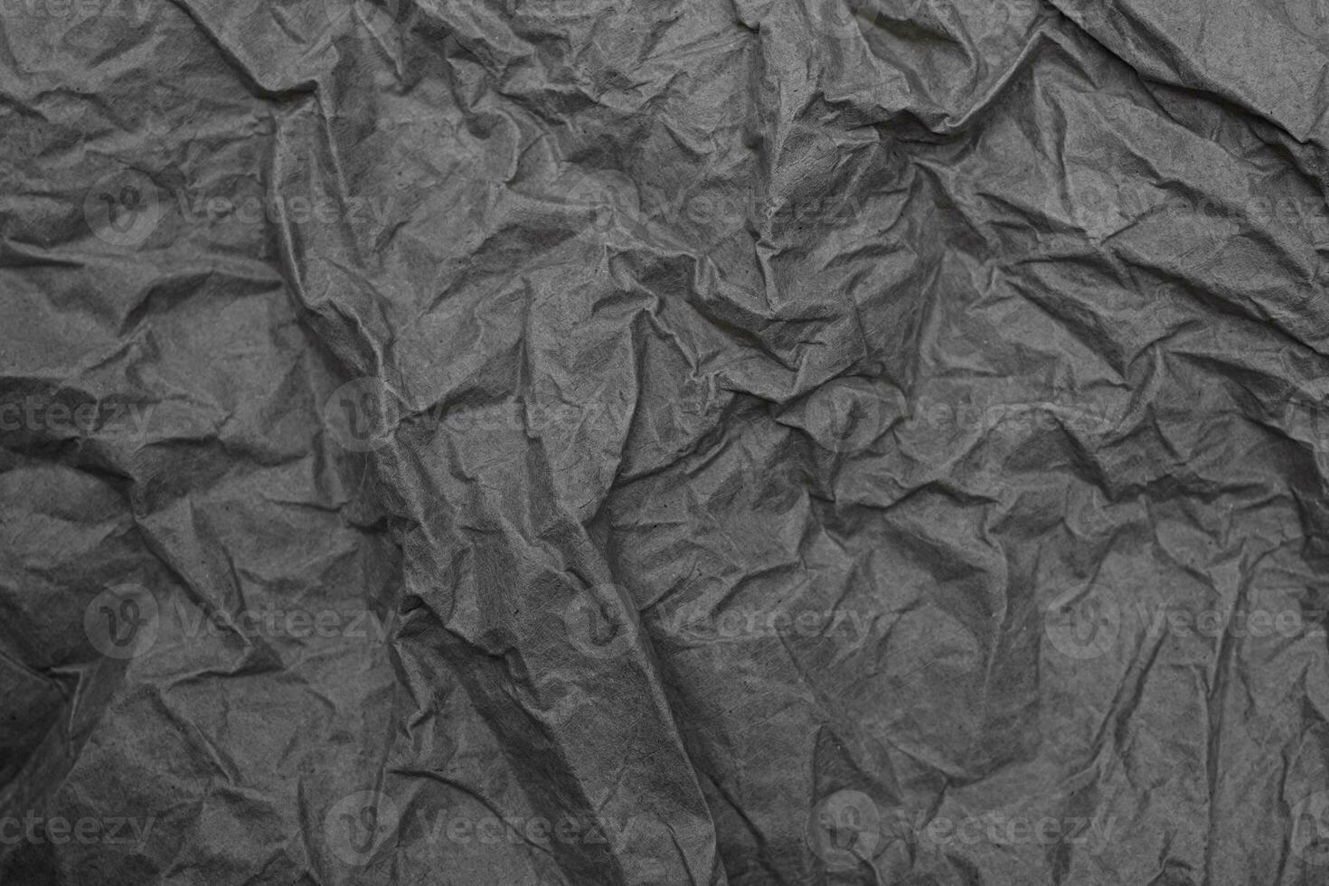 Close up crumpled creased paper old texture background photo