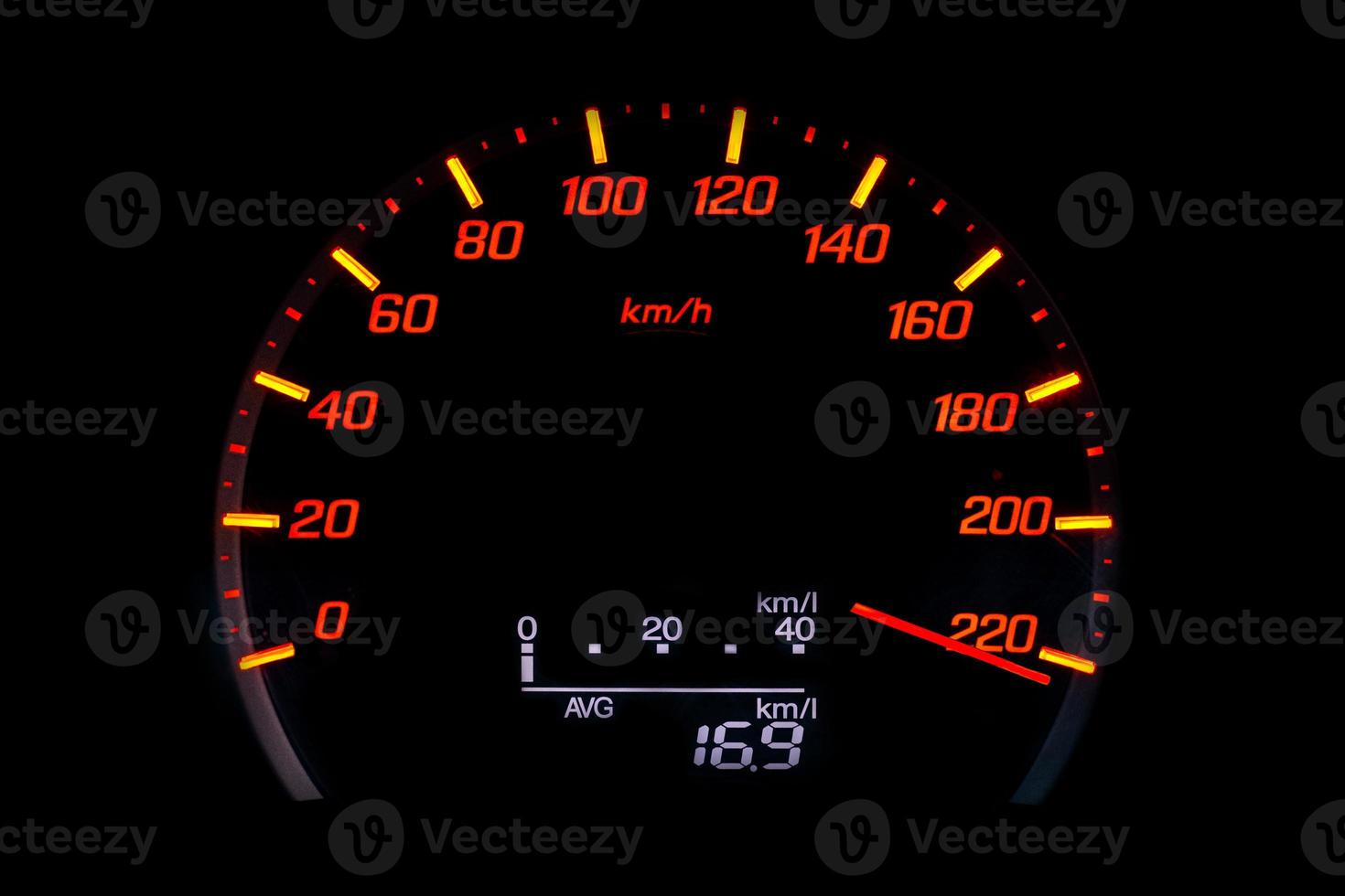 Car speedometer with the needle pointing at 220 kmh photo