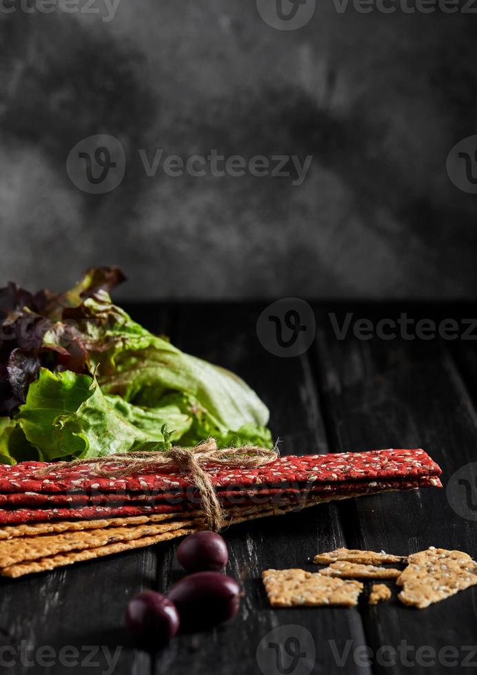 Beetroot and rye flour crackers with vegetables for making snacks photo