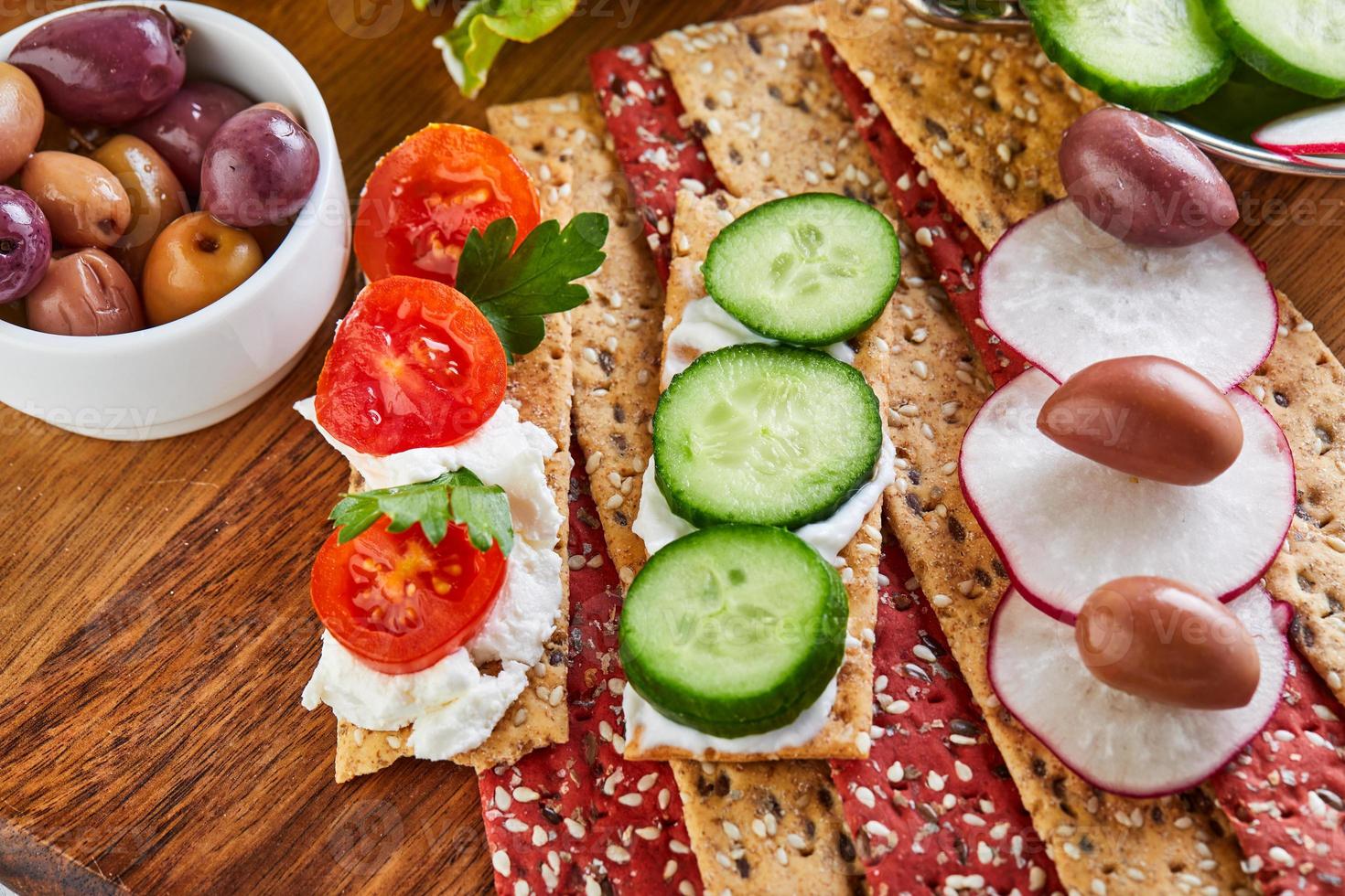 Beetroot and rye flour crackers with vegetables for making snacks photo