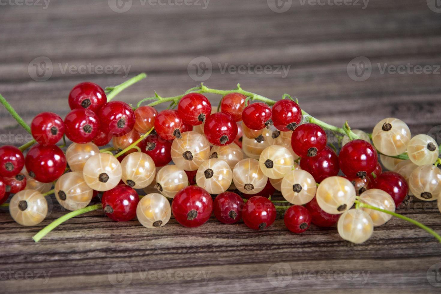 Red and white currants in a heap close-up. Berry background photo
