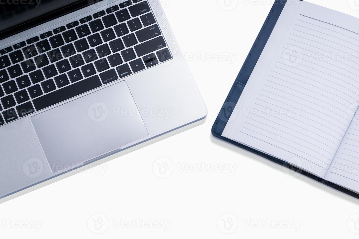 Laptop with book and copy space for business object photo