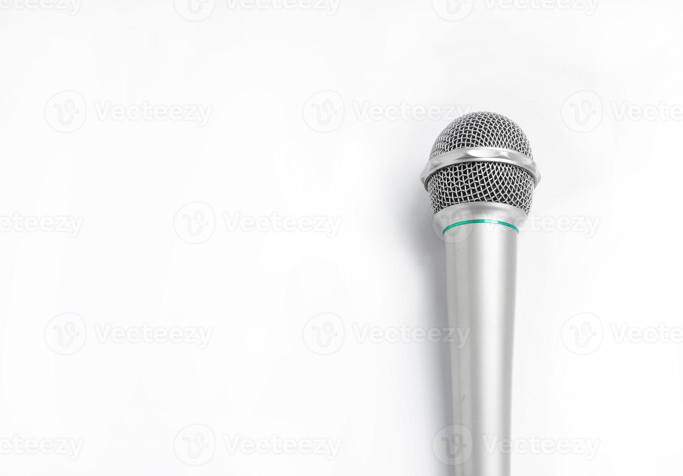 Silver microphone on white background. photo