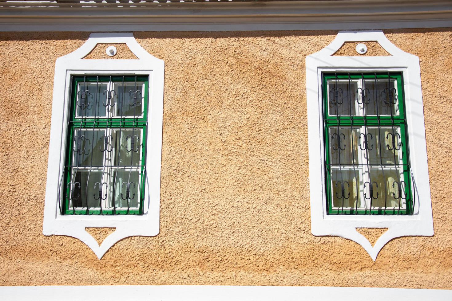 Grated windows at an old house in Biertan, Sibiu, Romania,2020 photo