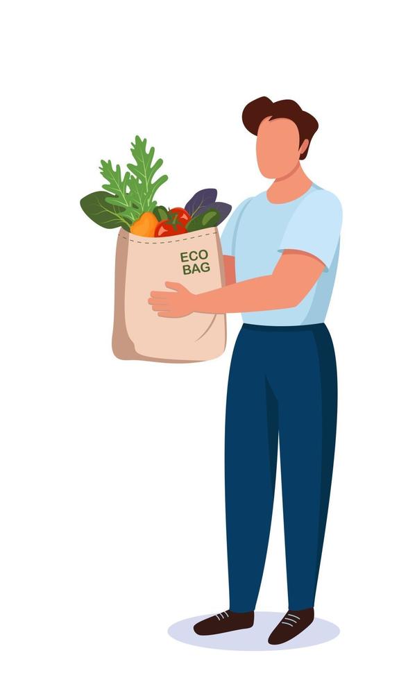 A man holds a textile bag with vegetables in his hands vector