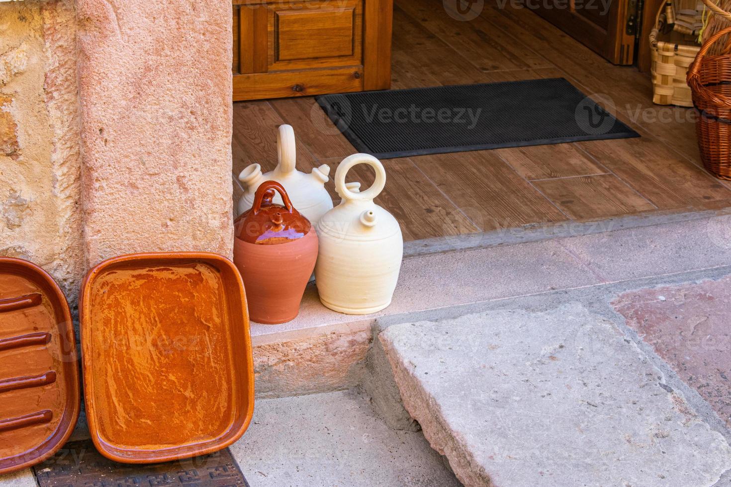 clay handicraft at the gate of a medieval city photo