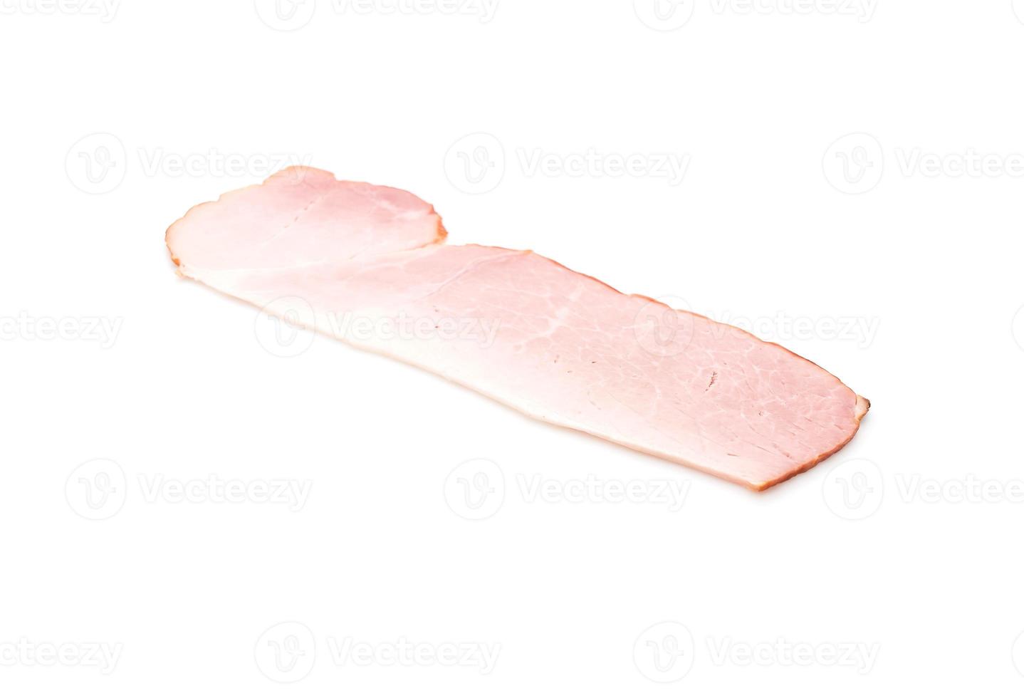 Sliced ham on white background photo