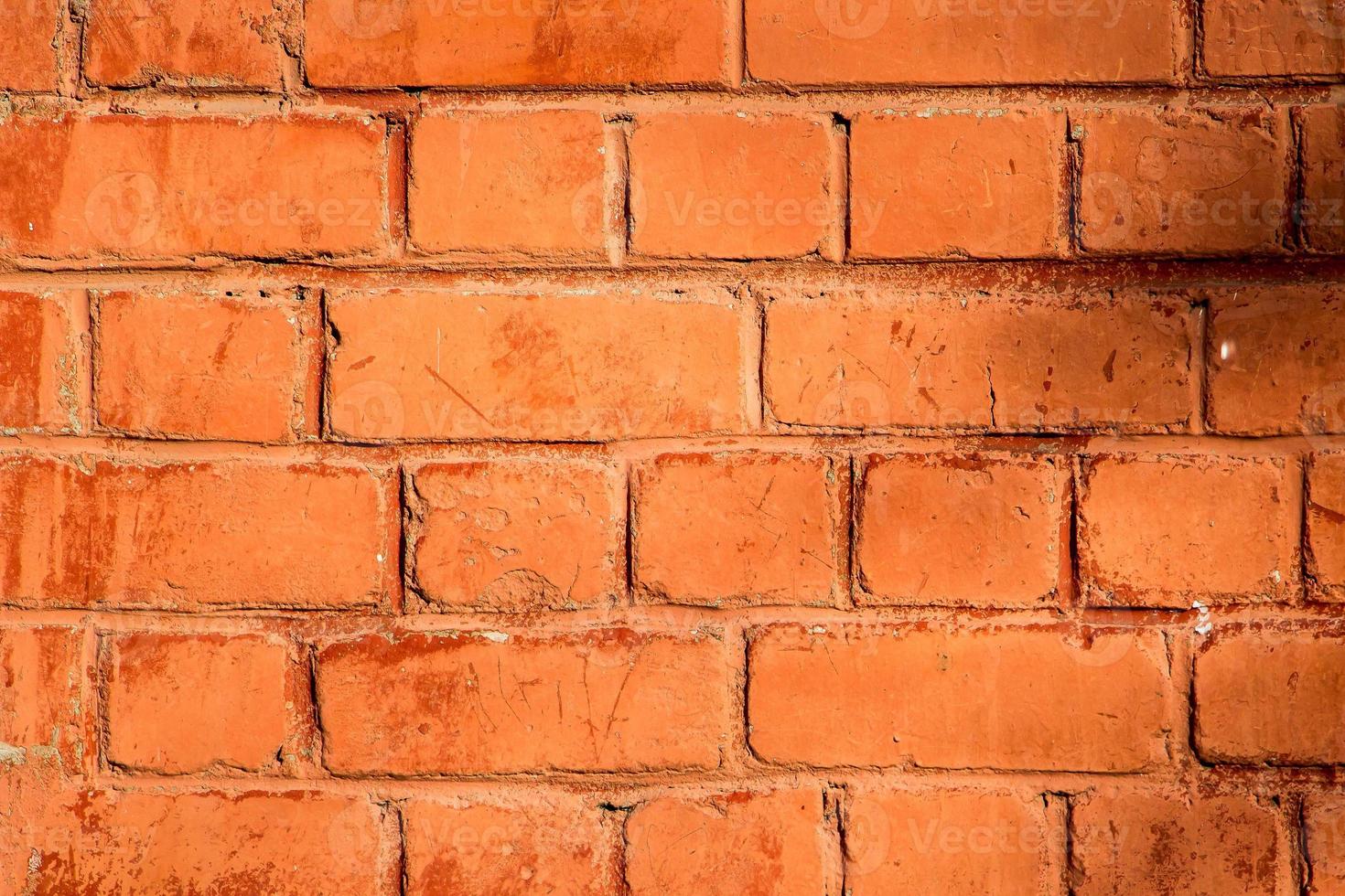 textura de pared de ladrillo naranja foto