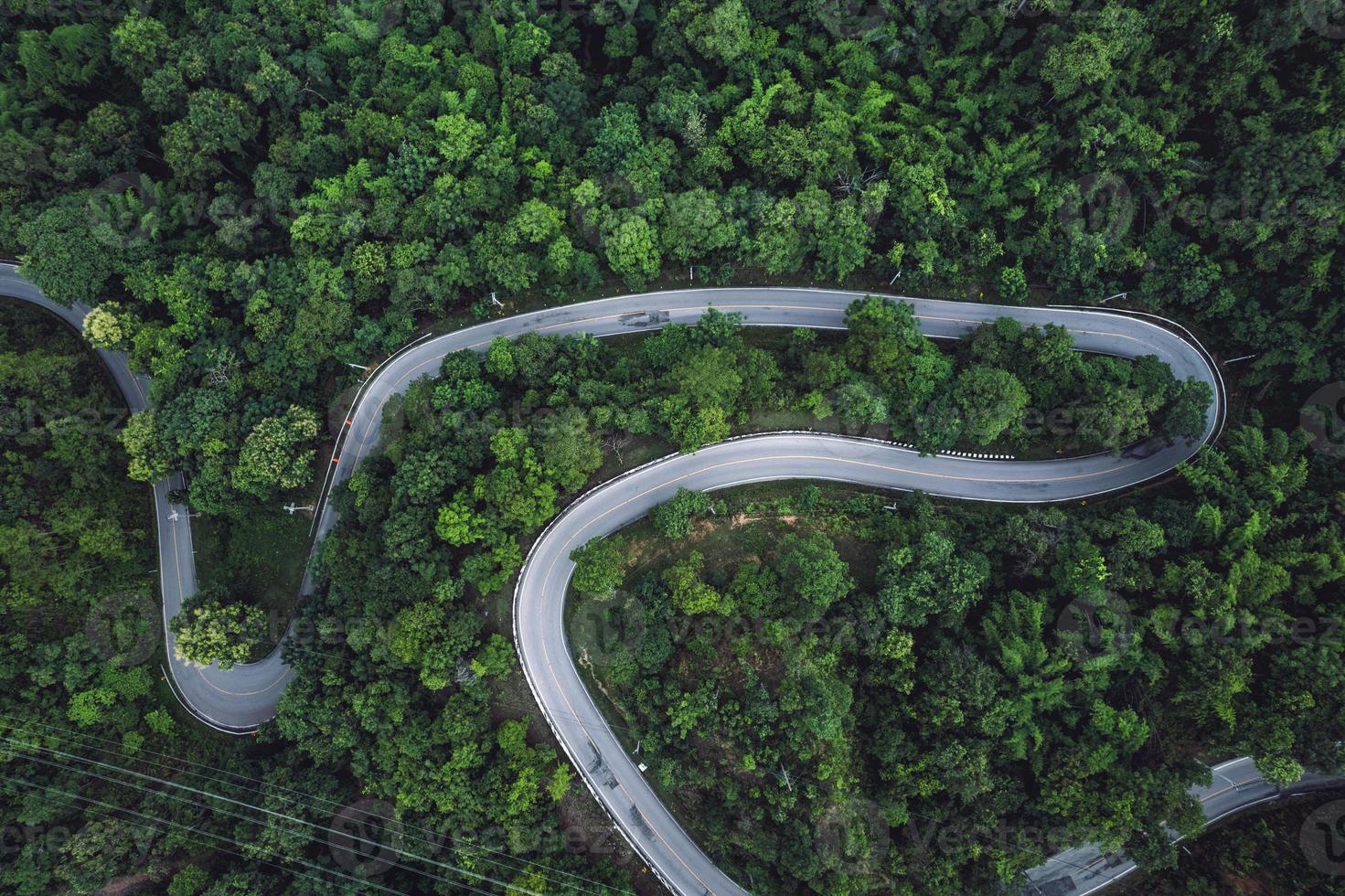 mountain road into a rural village form above photo