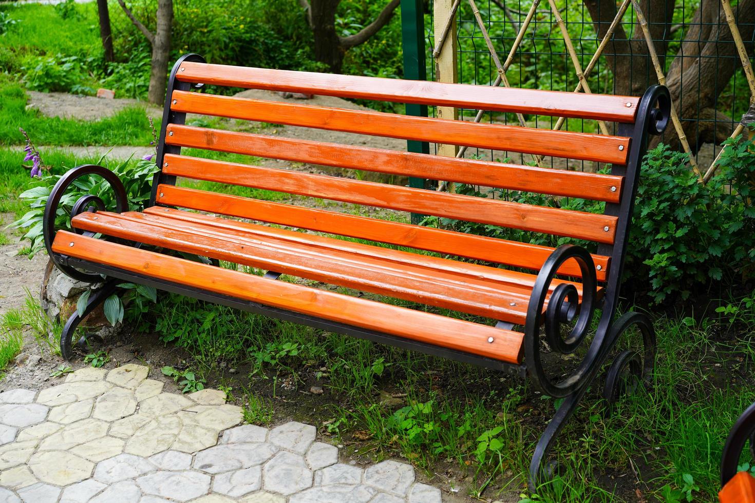 Garden wooden bench close-up. Without people photo