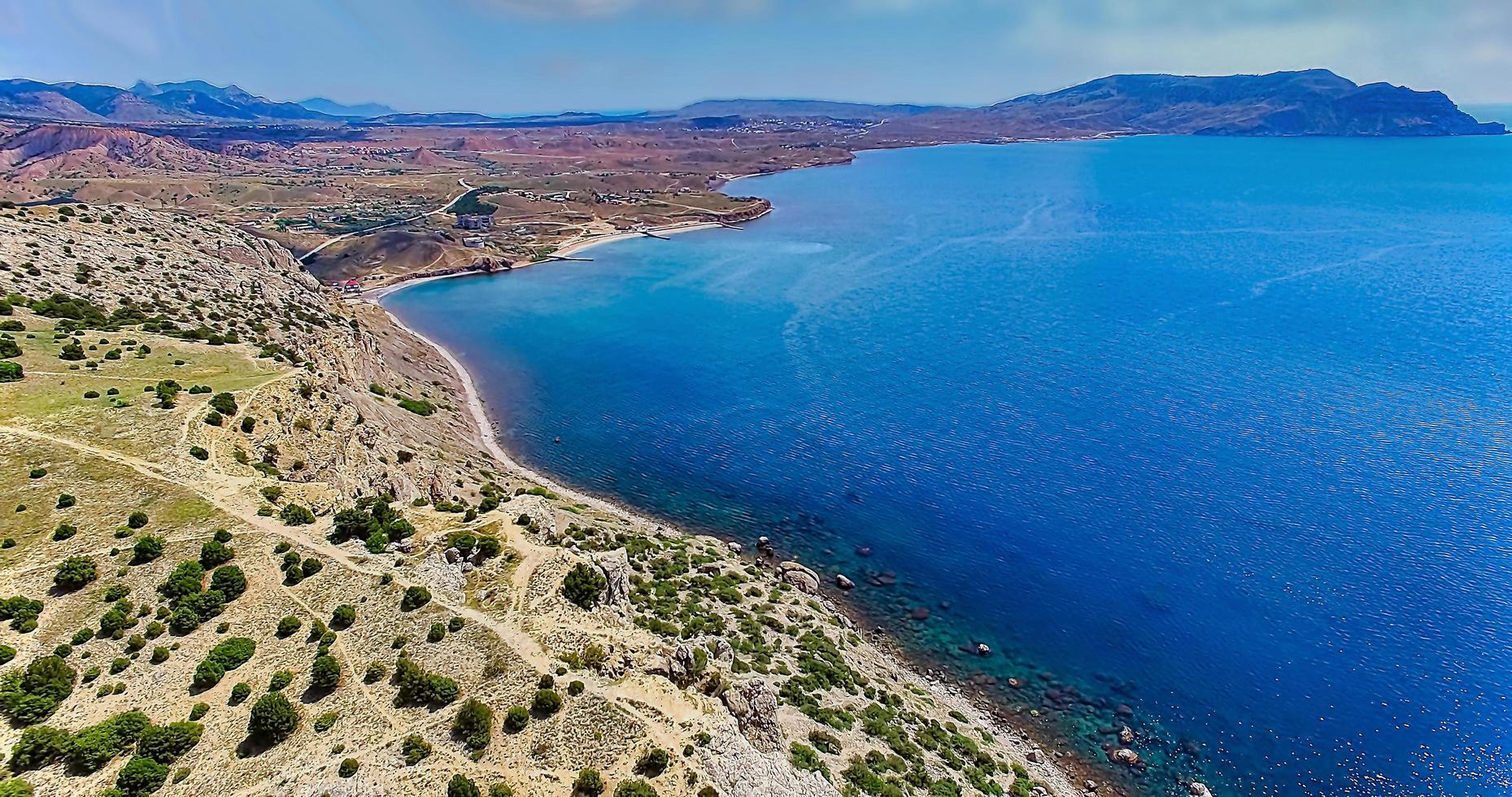 Marine landscape with views of the mountain covered photo